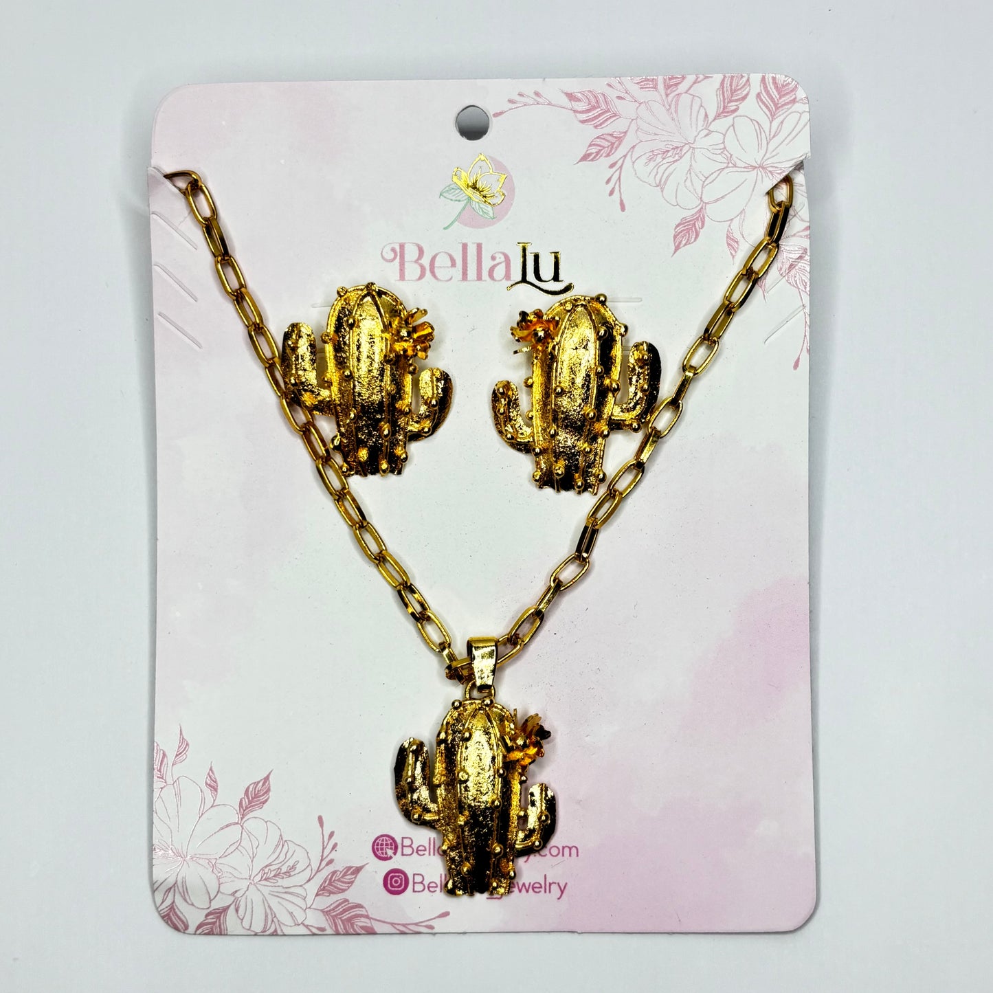 Jewelry set with cactus designs on a Bella Lu branded card.