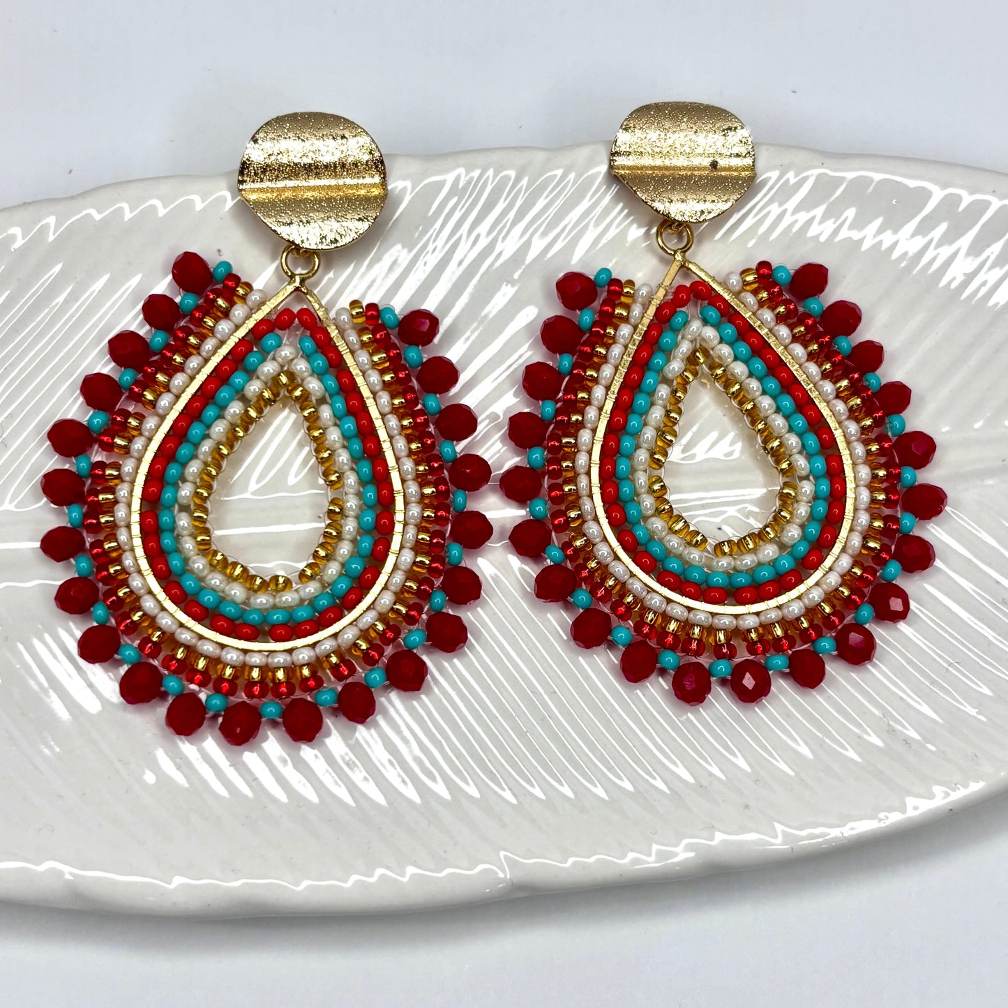 Serena Earrings featuring a sleek and polished design, offering timeless elegance and modern sophistication for any occasion.