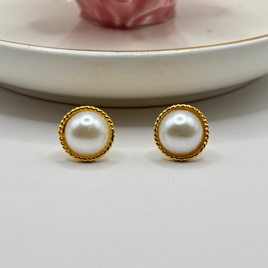 Elegant freshwater pearl earrings with a timeless design, adding a sophisticated and luxurious touch to any outfit.