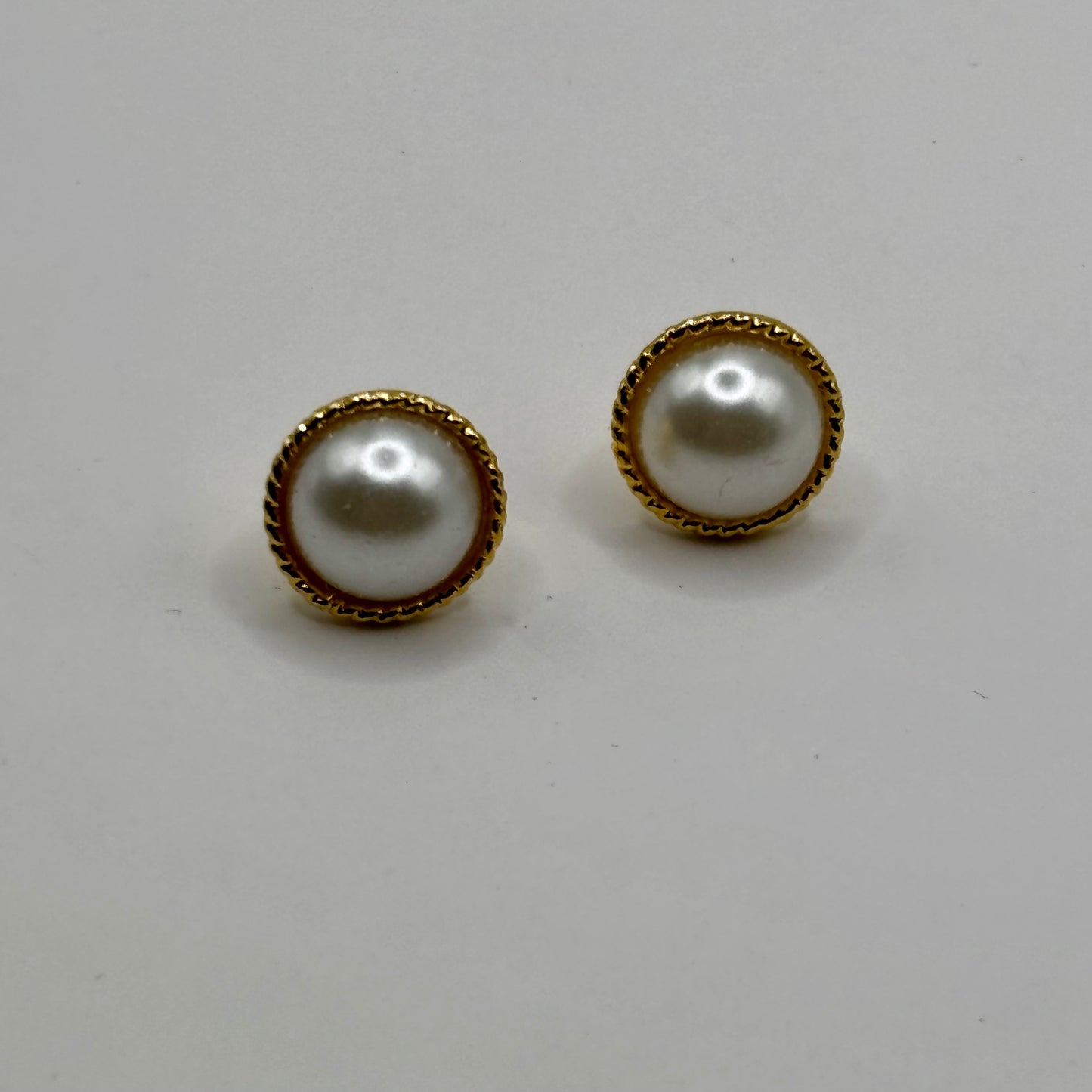 Elegant freshwater pearl earrings with a timeless design, adding a sophisticated and luxurious touch to any outfit.