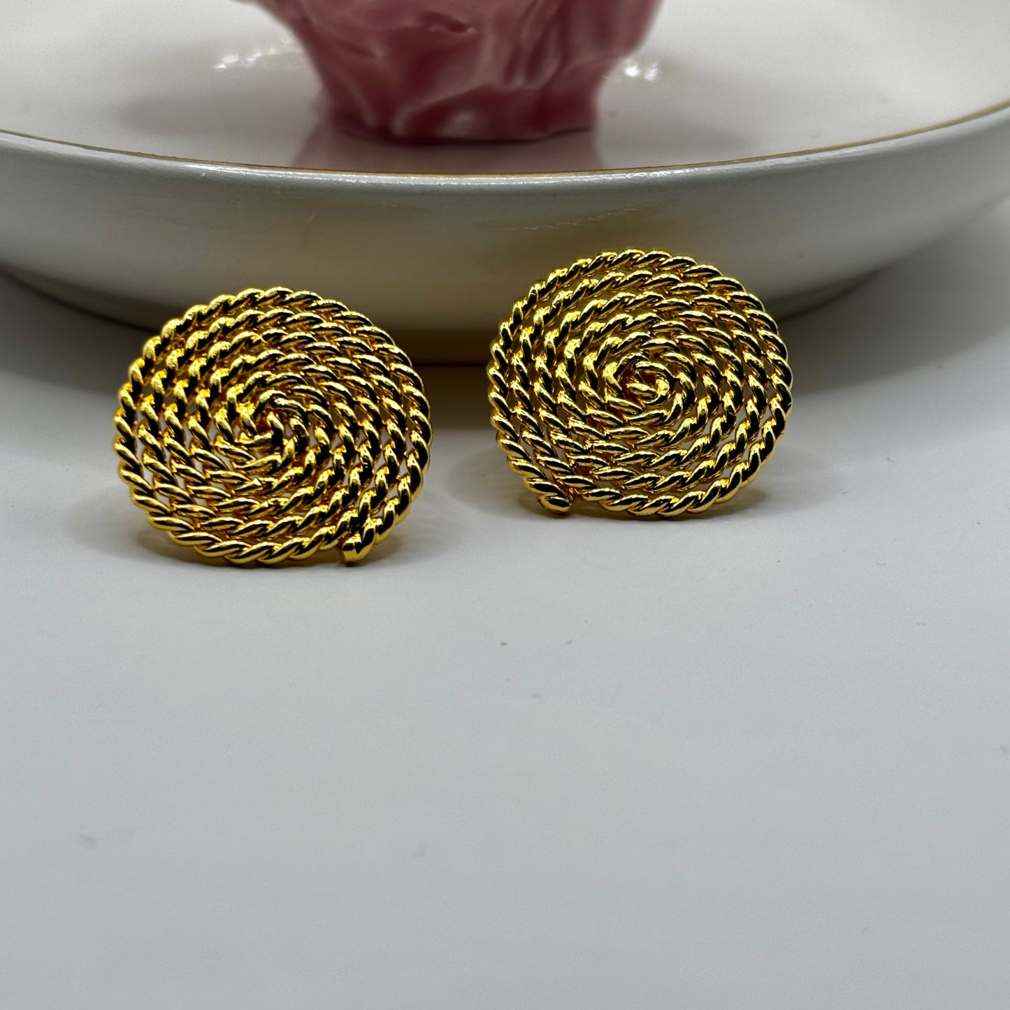 Vintage rope earrings with intricate detailing, adding a timeless and elegant touch to any ensemble.