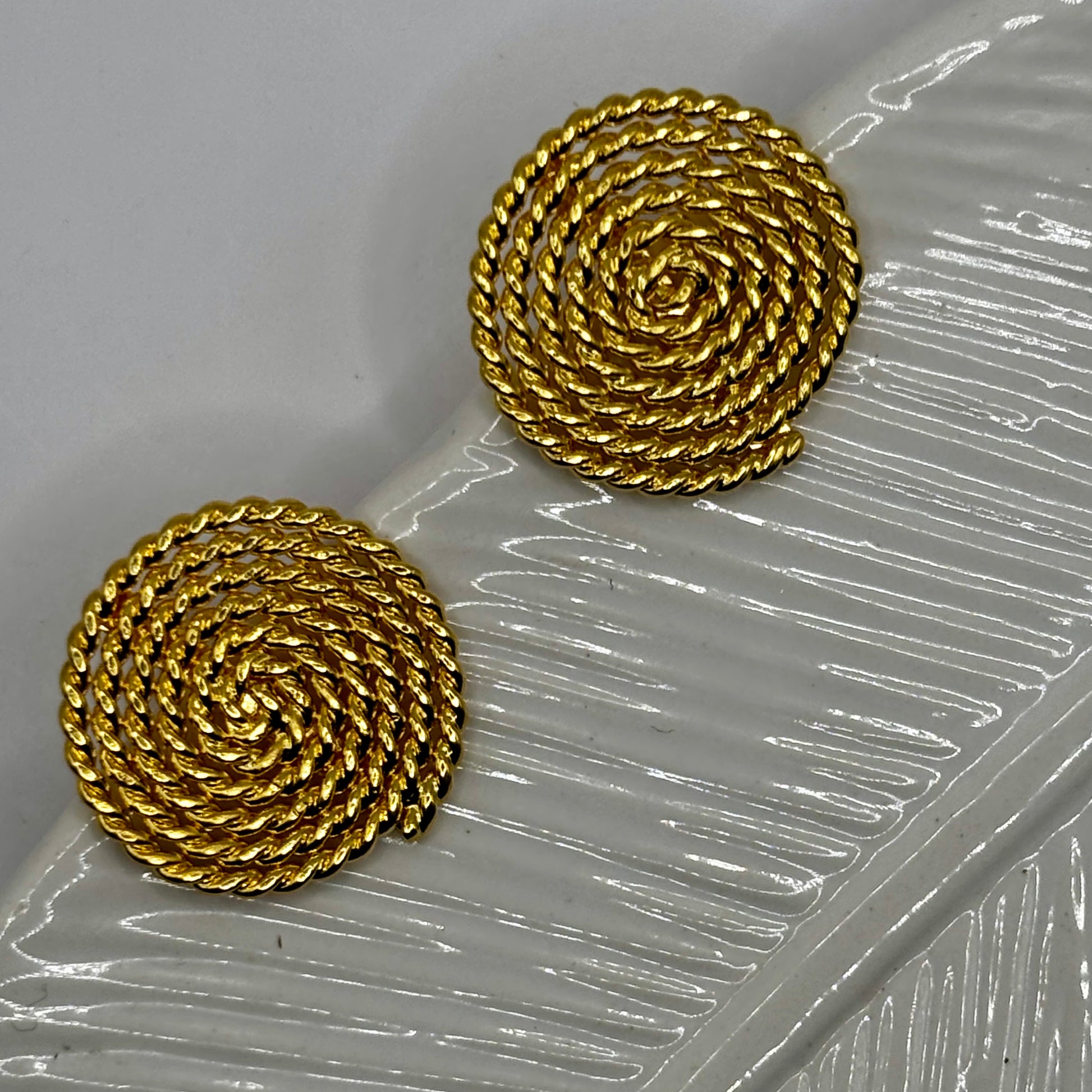 Vintage rope earrings with intricate detailing, adding a timeless and elegant touch to any ensemble.