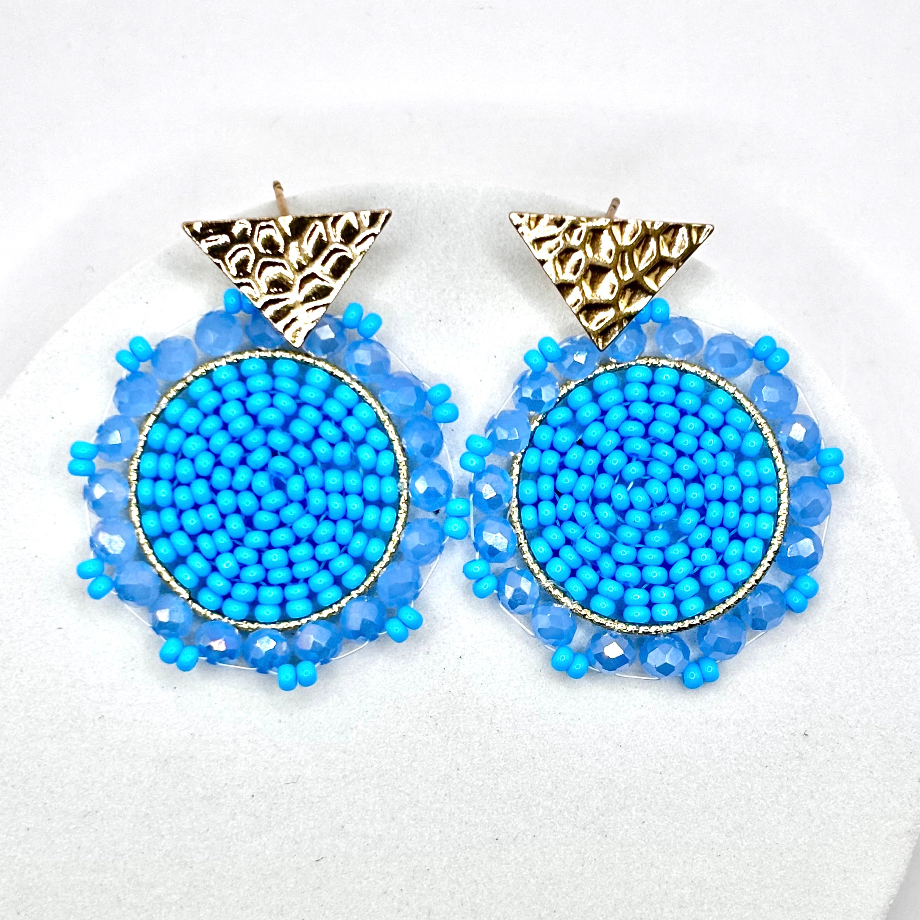 Blue
A pair of elegant Kara Earrings with a sleek, modern design, perfect for any occasion.