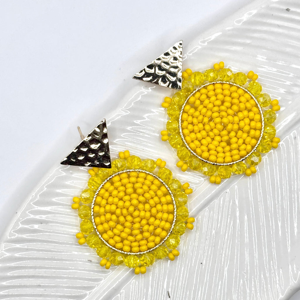 Yellow
A pair of elegant Kara Earrings with a sleek, modern design, perfect for any occasion.