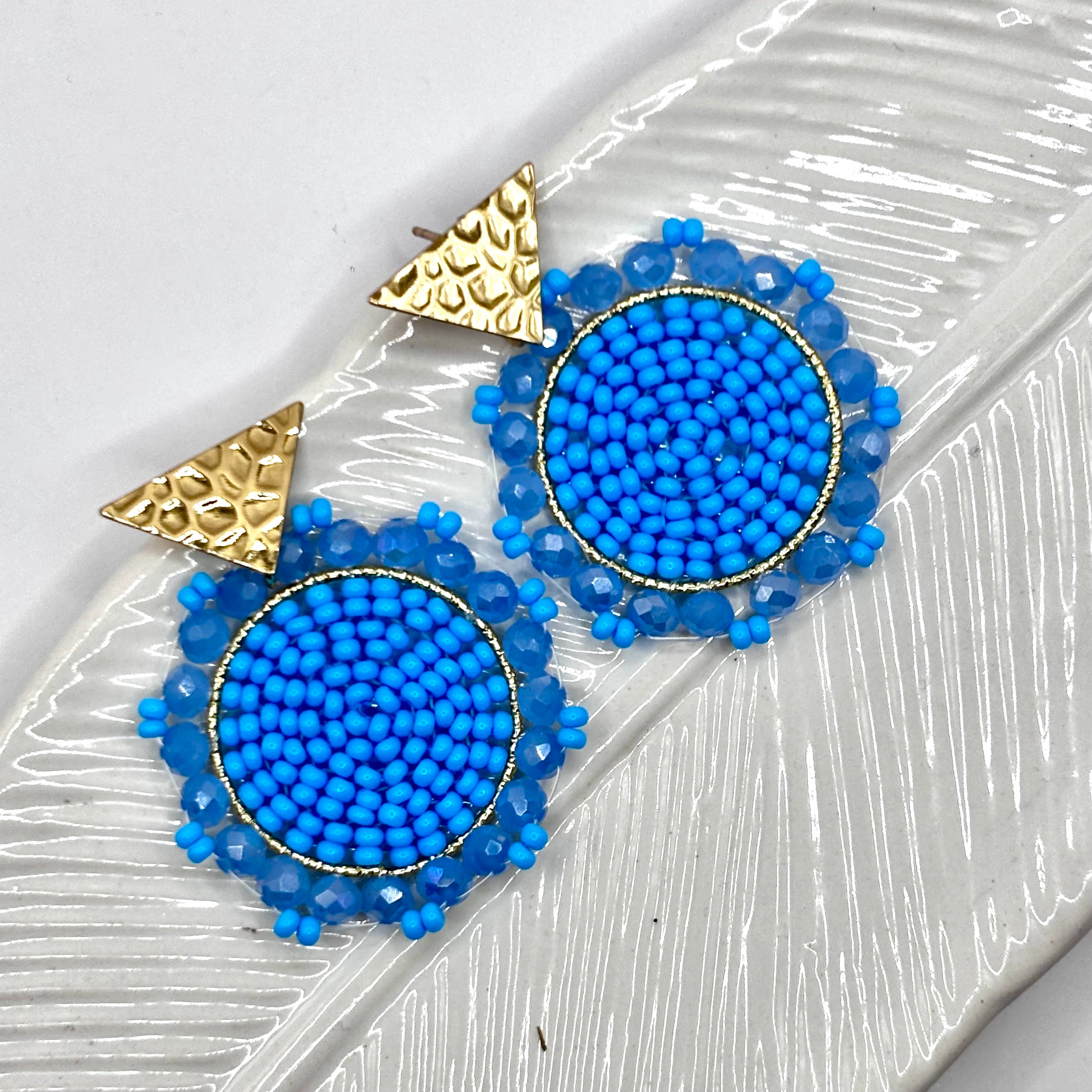 Blue
A pair of elegant Kara Earrings with a sleek, modern design, perfect for any occasion.