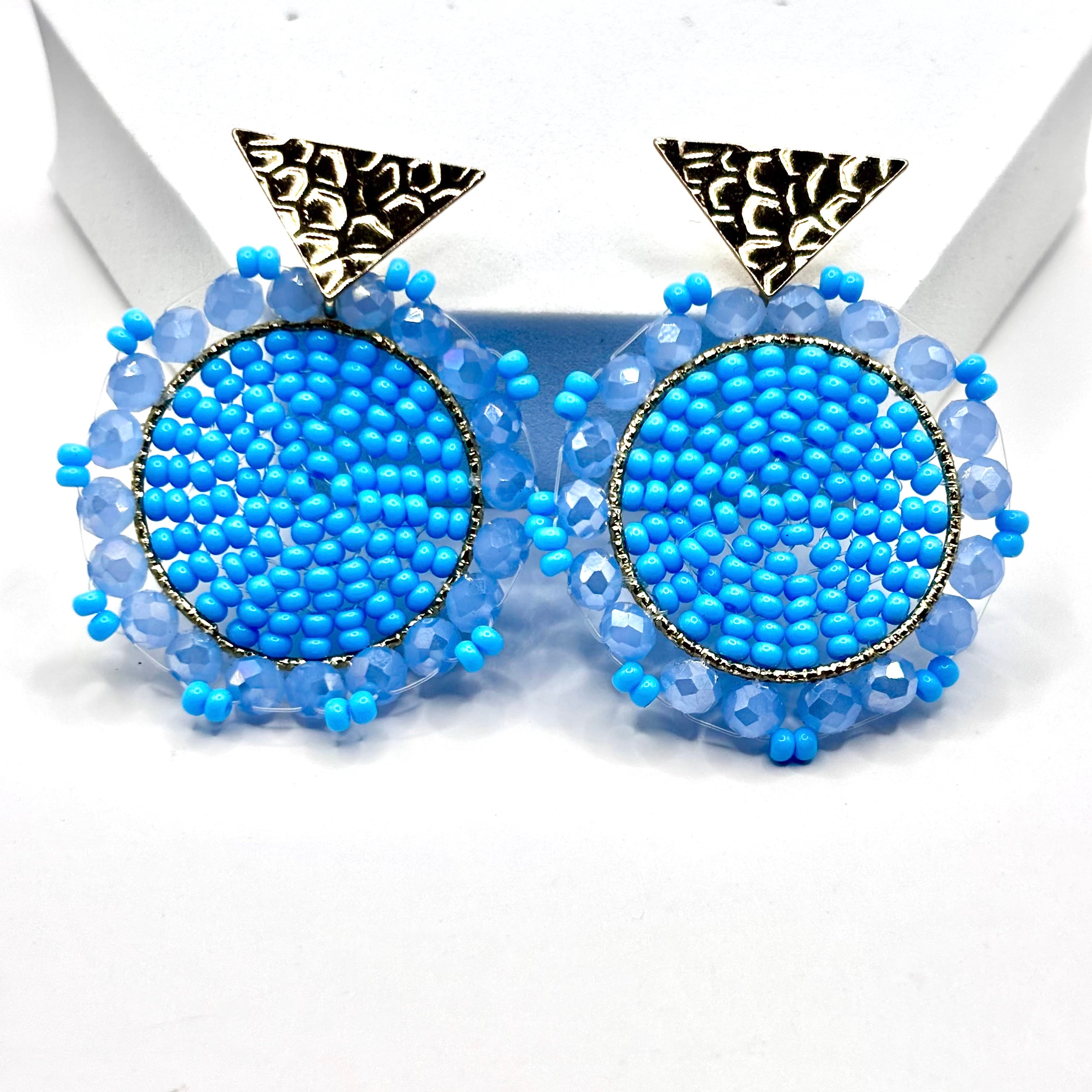 Blue
A pair of elegant Kara Earrings with a sleek, modern design, perfect for any occasion.