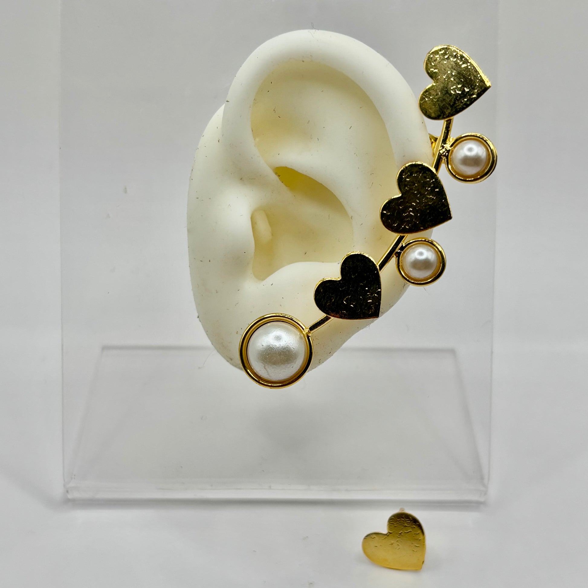 Heart-shaped ear wrap jewelry accessory designed to fit around the ear for a stylish, romantic look