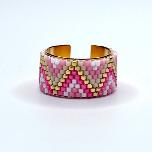 Miyuki beaded ring with pink, white, and gold beads  