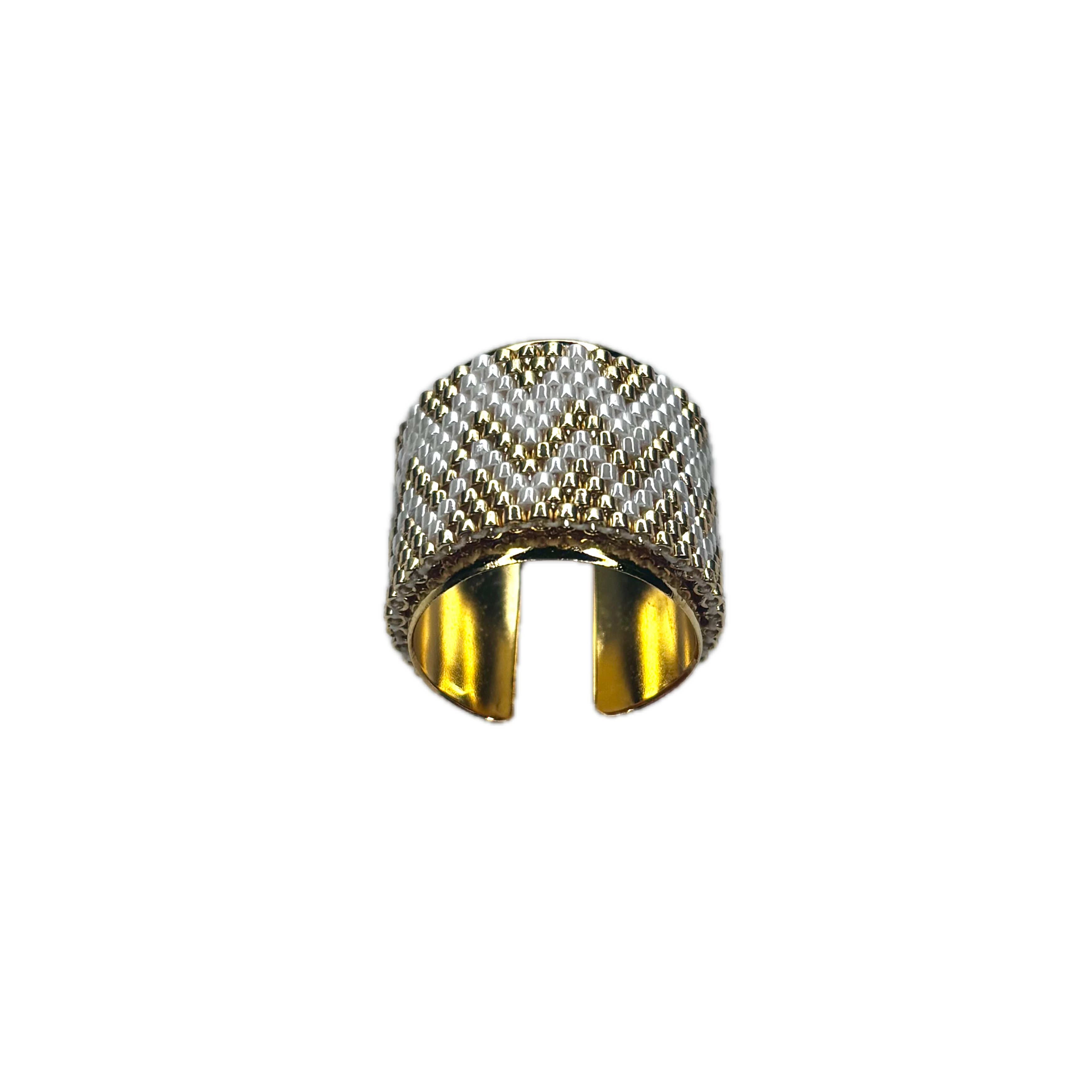 Gold and silver ring on a white background