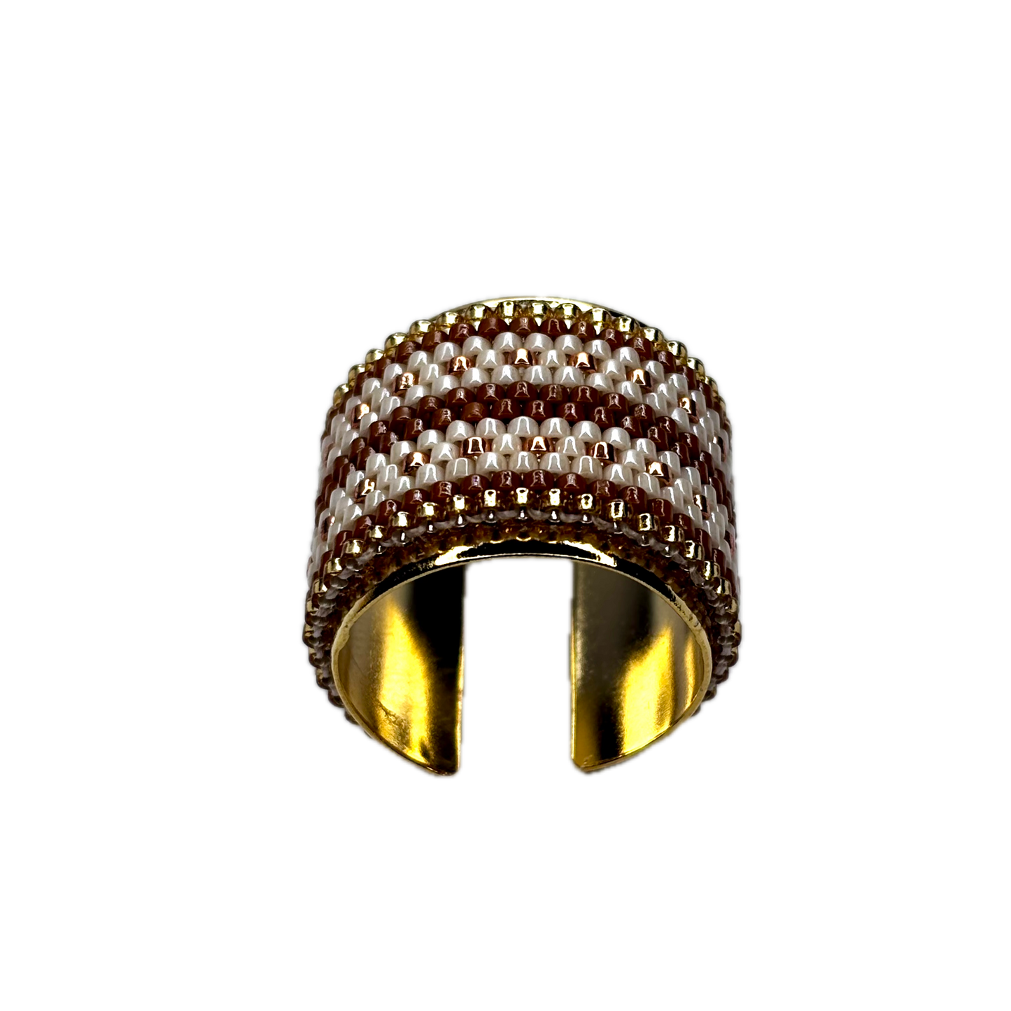 Wide gold ring with a textured band on a white background
