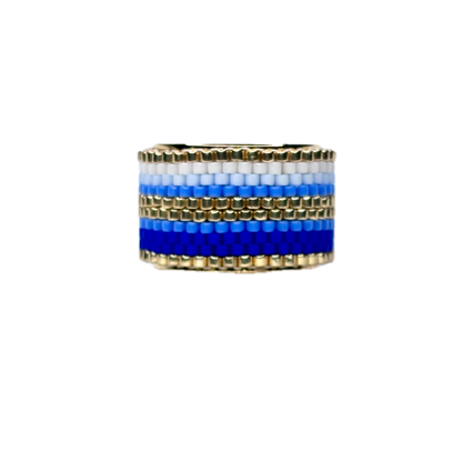 Beaded ring with blue and white stripes on a white background