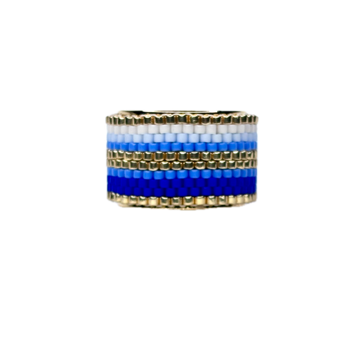 Beaded ring with blue and white stripes on a white background