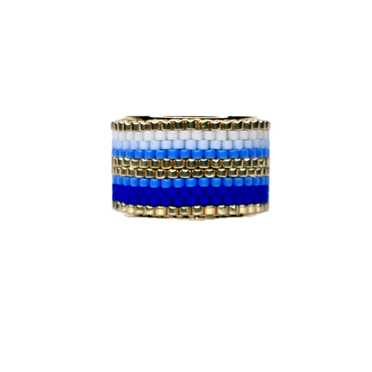 Beaded ring with blue and white stripes on a white background