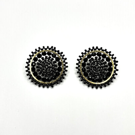 Black beaded earrings on a white background