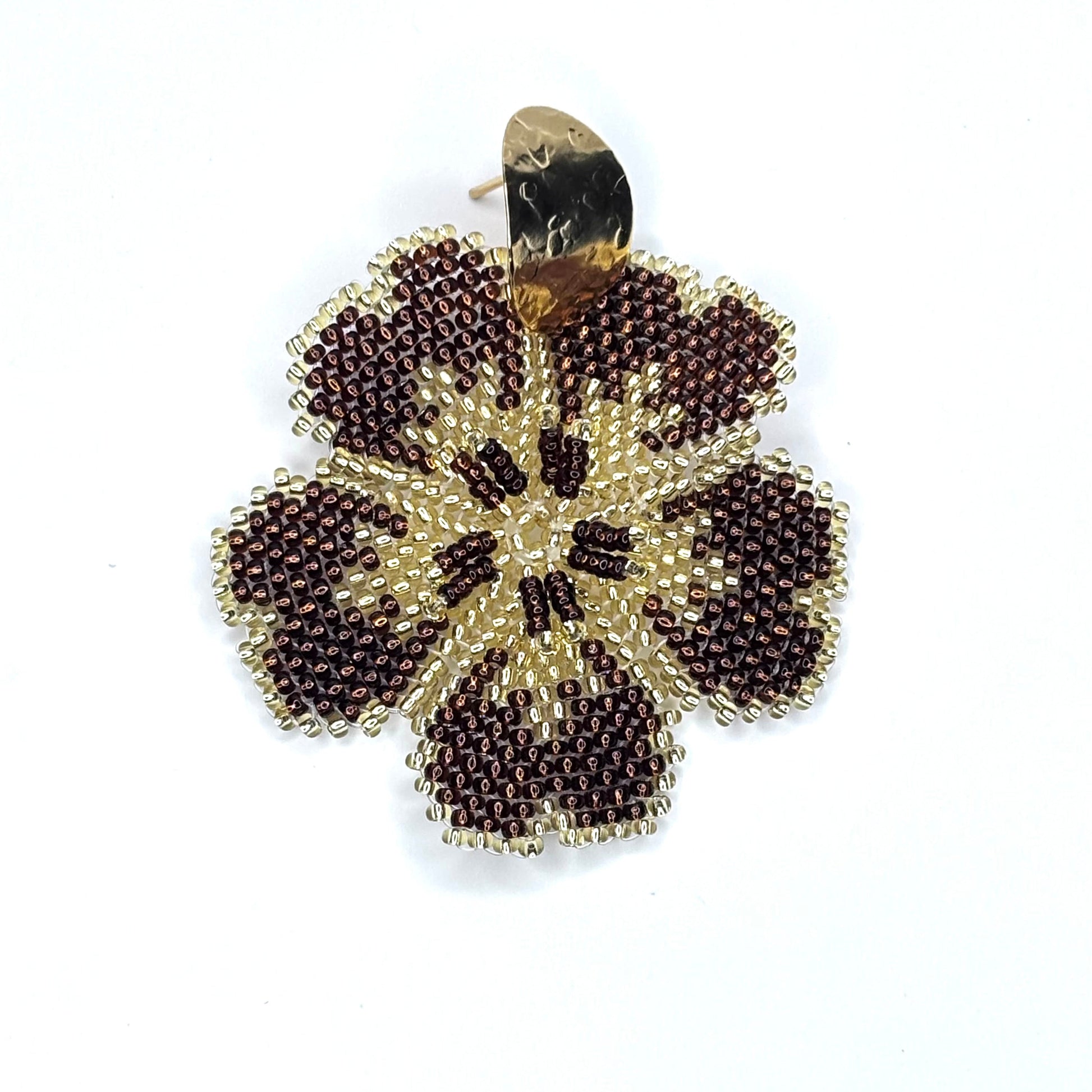 Beaded flower-shaped earring brown on a white background