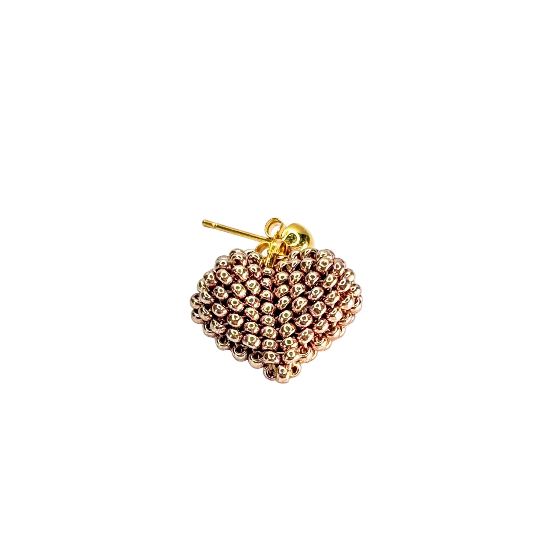 Gold beaded heart-shaped earring on a white background