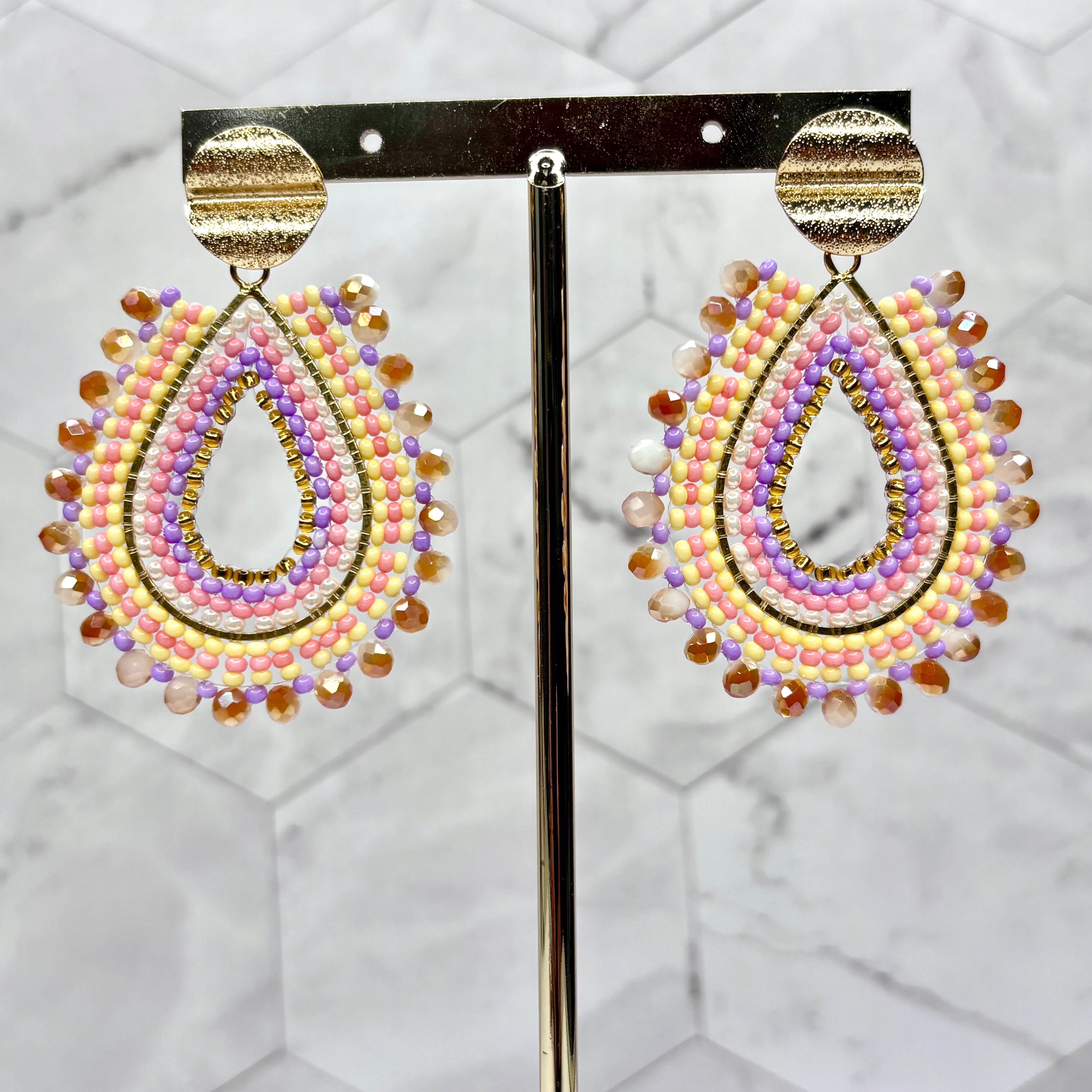 Serena Earrings featuring a sleek and polished design, offering timeless elegance and modern sophistication for any occasion.