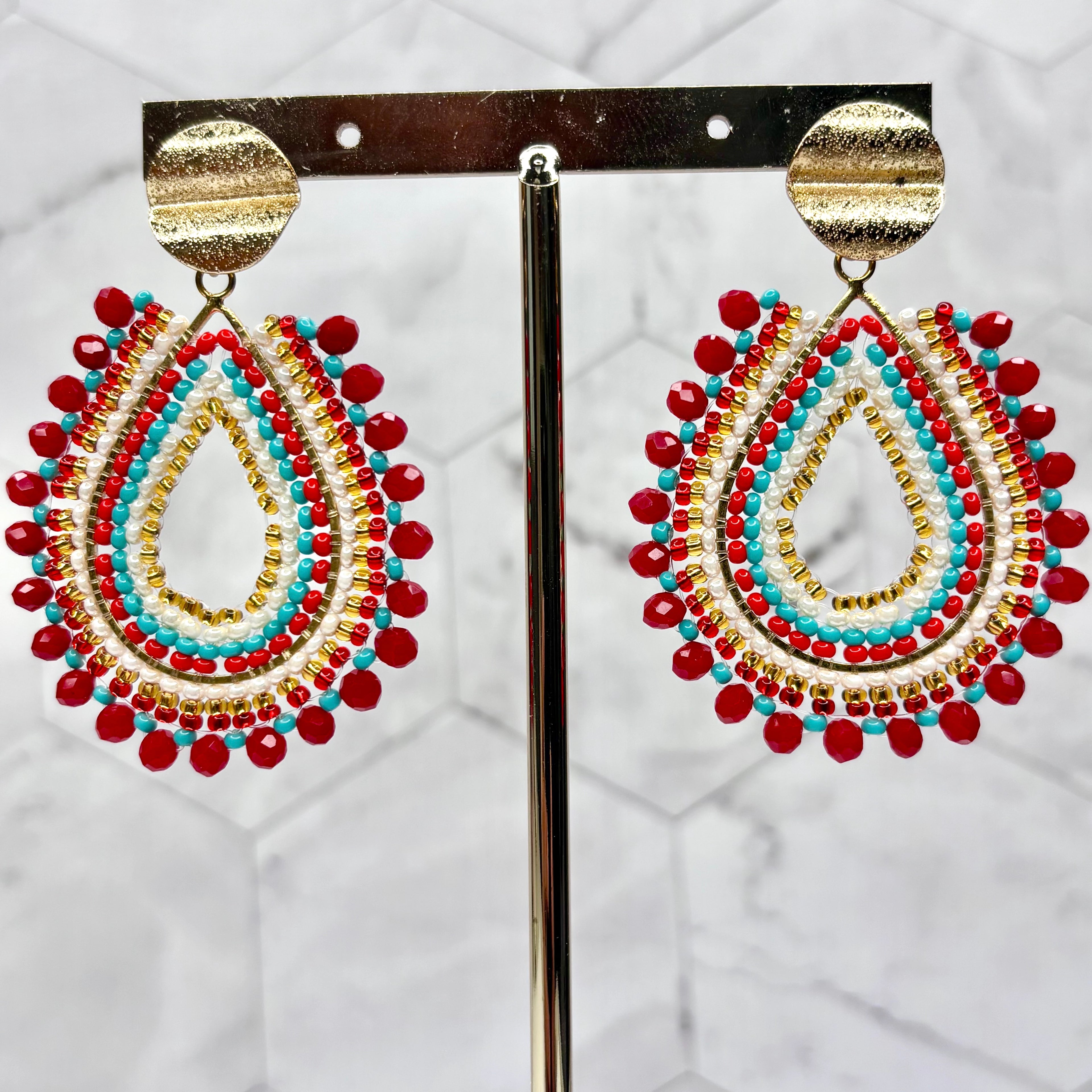 Serena Earrings featuring a sleek and polished design, offering timeless elegance and modern sophistication for any occasion.